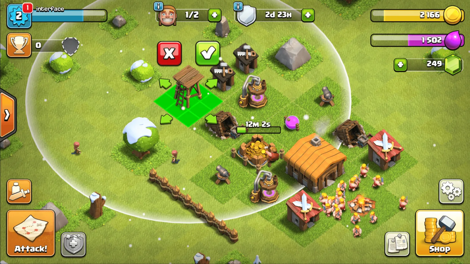 A Clash of Clans village in build mode, with structures arranged on a green base.